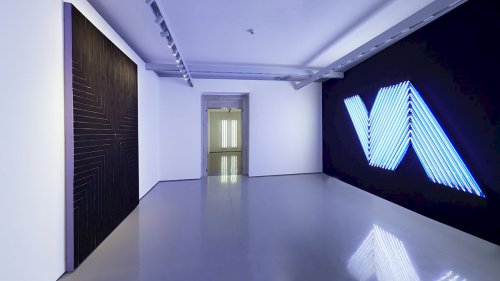 On the left: Sturtevant, "Stella Die Fahne hoch!", 1990. Pinault Collection. Courtesy the artist and Galerie Thaddaeus Ropac, Paris/Salzburg.  On the right: Bertrand Lavier, "Ifafa III", 2003. Pinault Collection. Courtesy the artist and Yvon Lambert, Paris 